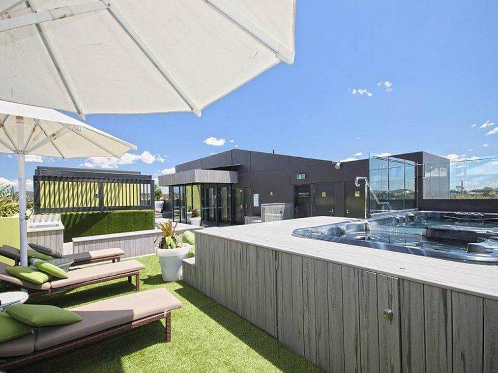Eastwood Apartments Брисбен Экстерьер фото The rooftop spa at the hotel