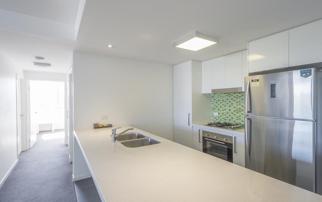 Eastwood Apartments Брисбен Экстерьер фото A kitchen in a student apartment at the University of New South Wales