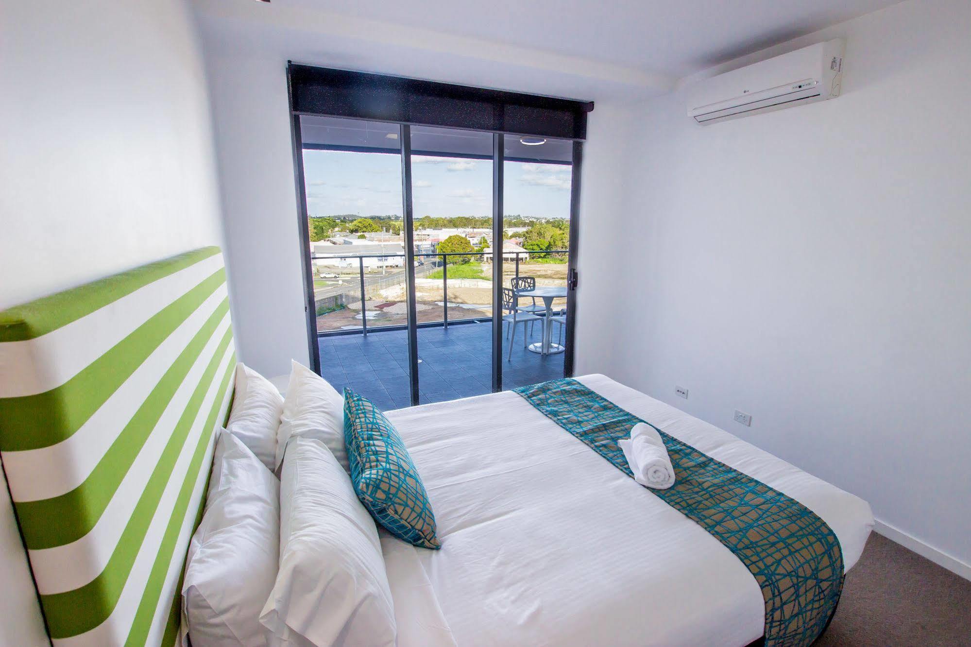 Eastwood Apartments Брисбен Экстерьер фото A bedroom at the hotel